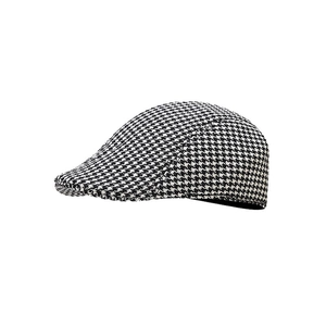 Berretto classico a quadretti pied-de-poule bianco e nero in stile vintage inglese