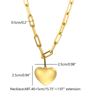 Detail view of gold heart pendant with paperclip chain measurements and dimensions