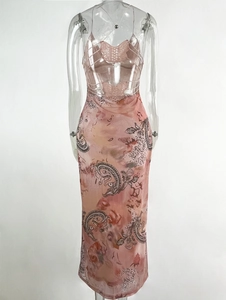 Detail view of double-layer mesh dress back with butterfly lace cut-outs and paisley print