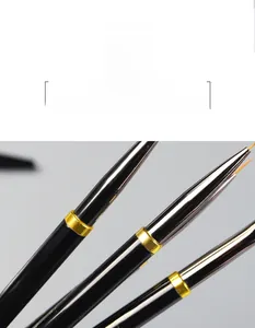 Close-up of three nail art liner brushes with vacuum-pressed metal ferrules and black handles