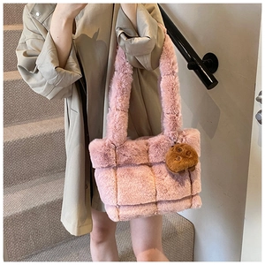 Pink faux fur quilted shoulder bag detail with cute brown plush bear charm accessory