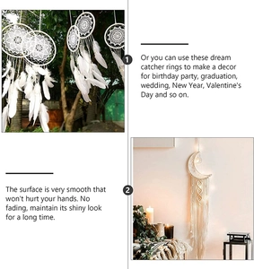 Detail of white moon dream catcher with feathers and beads for home wall decoration