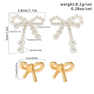 Detailed size specifications for bow earrings set with pearls and gold metal finish