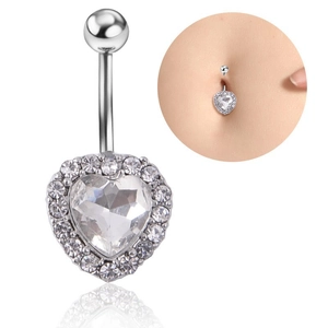 Macro detail of silver double heart belly button ring with sparkling cubic zirconia stones