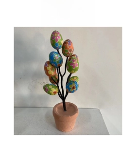 Easter egg bonsai tree with colorful floral patterns in a terra cotta pot decoration