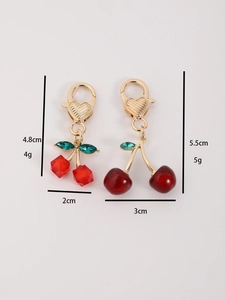 Detailed size specifications for red cherry keychains with gold heart clasps