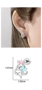 Detailed view of silver bow cartilage stud with pink star and blue heart stone