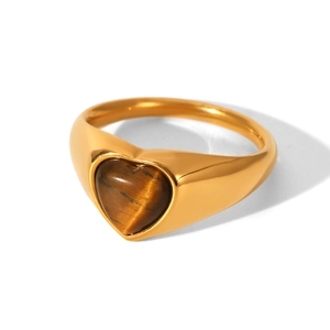 Macro shot of 18k gold stainless steel heart-shaped tiger eye stone signet ring detail