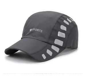 Detail of breathable grey quick-dry sports cap with mesh stripes and logo