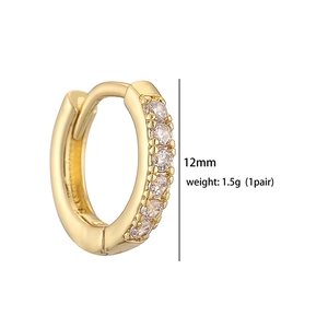 Detail showing 12mm gold-plated hoop earrings with micro-set cubic zirconia stones
