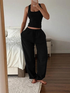 Women's 2-piece yoga set with black camisole top and matching lounge pants full view