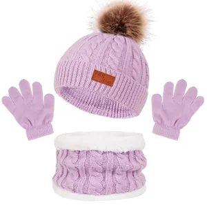 Detailed view of purple knit hat scarf and gloves set with warm fleece lining