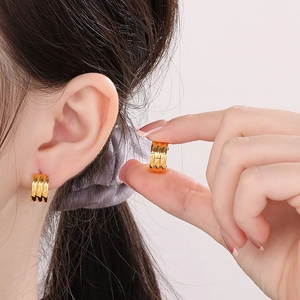 Polished 18K gold-plated triple-row wavy hoop earrings for women with mirror finish