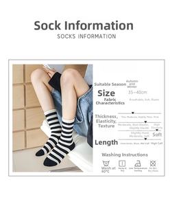 Detail view of black and white striped crew socks with soft breathable cotton fabric