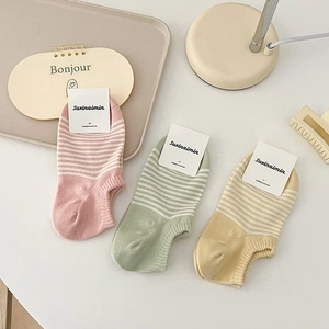 Striped low-cut cotton socks for women in soft pink, green, and yellow pastel colors