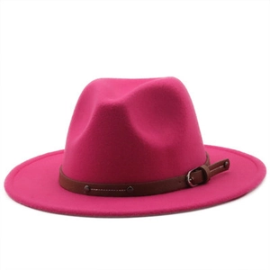 Detail of hot pink fedora hat with a brown faux leather belt and silver metal buckle