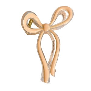 Elegant large bow hair claw clip in soft pink resin with gold metal spring for women