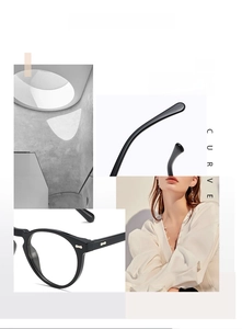 Detail of vintage round black frames with silver metal rivets and elegant temple hinges