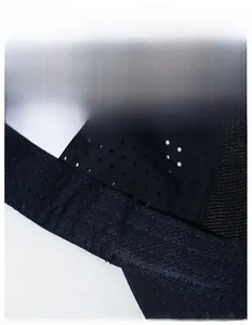 Detail view of the wide moisture-wicking sweatband and breathable mesh lining of the cap