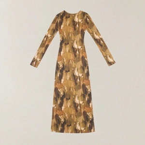 Detail of slim-fit maxi dress featuring abstract vintage print and long sleeves