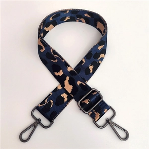 Adjustable leopard print bag strap in navy and beige with gunmetal swivel hooks