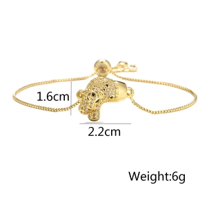 Detailed view of gold plated leopard head bracelet with cubic zirconia and dimensions