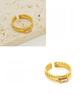 Detail of adjustable 18K gold plated Cuban chain rings with pink and clear zircon stones