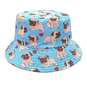 Light blue bucket hat with pug patterns and red hearts on a clean white background