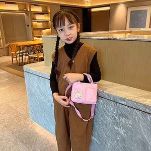 Pink heart-quilted crossbody bag for girls featuring a cute 3D bunny rabbit patch