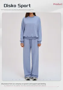 Detail of light blue tracksuit with loose sweatshirt and wide-leg drawstring pants