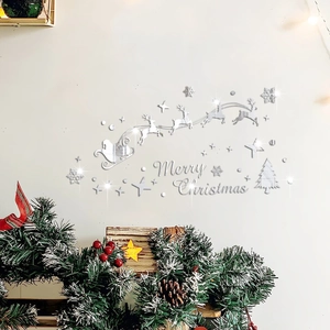 Close-up of silver mirror acrylic Christmas wall stickers with Santa and reindeer decor