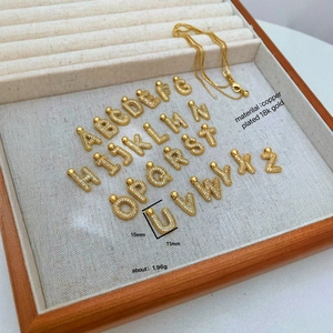 18k gold plated 26 English letter pendants set with micro-inlaid zircon in wood box
