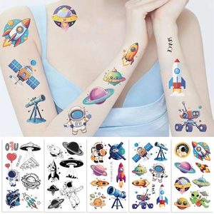 Space themed temporary tattoos featuring astronauts and rockets on the arm