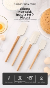 Close-up of four silicone spatulas with beech wood handles for professional baking