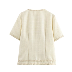 Vue arrière du haut en tweed beige avec des franges élégantes et une texture tissée