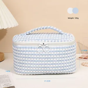 Blue and white checkered plush makeup bag detail showing size 21.5x14x11.8cm