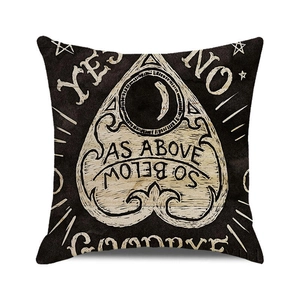 Macro detail of Halloween Ouija board linen cushion cover with As Above So Below print