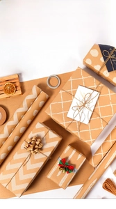 Macro view of kraft wrapping paper with geometric patterns and rustic gift packaging