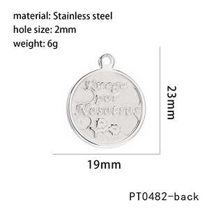 Macro view of 19mm stainless steel religious pendant with Ruega por Nosotros engraving