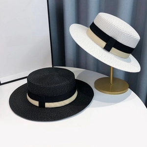 French style boater straw hat with contrast ribbon trim for beach vacation