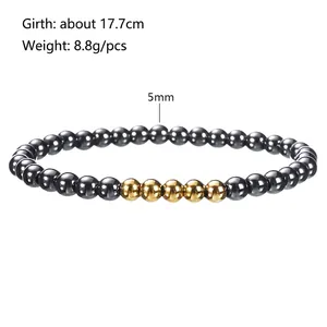 Detail showing 5mm dark grey hematite beads and gold accents on an elastic bracelet