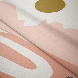 Close-up of abstract geometric tapestry fabric showing soft texture and pastel colors