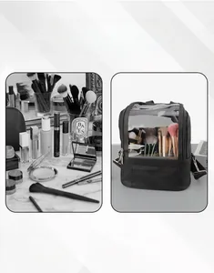 Macro view of clear window and brush slots in a black professional makeup organizer bag
