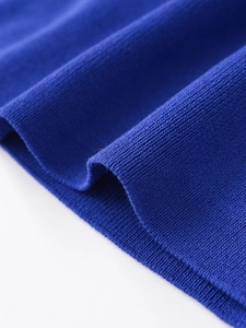 Detailed close-up of premium royal blue ribbed knit fabric showing texture and density