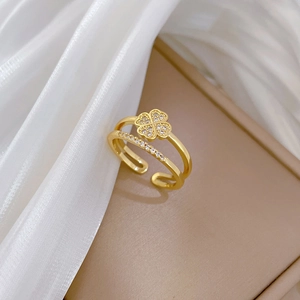 Adjustable gold plated clover ring with double layer band and pave set crystals