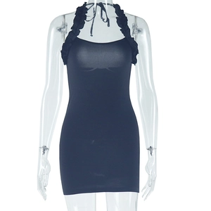 Detail of black mini dress featuring a halter neck with elegant ruffle trim and slim fit cut