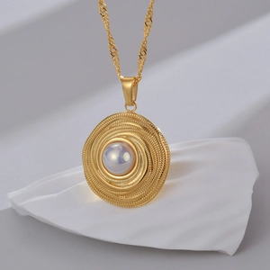 Titanium steel necklace with spiral gold pendant and central pearl on a white stone base