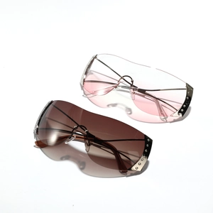 Y2K frameless oversized shield sunglasses with diamond accents and slim metal temples