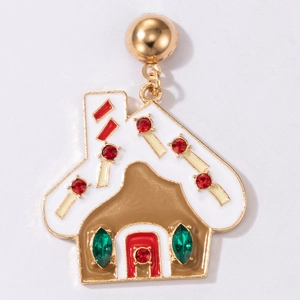 Macro detail of gingerbread house earring with colorful rhinestones and enamel finish
