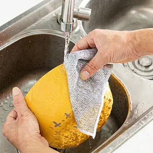Dual-sided silver wire dishcloth for cleaning pots and kitchen stoves in a sink